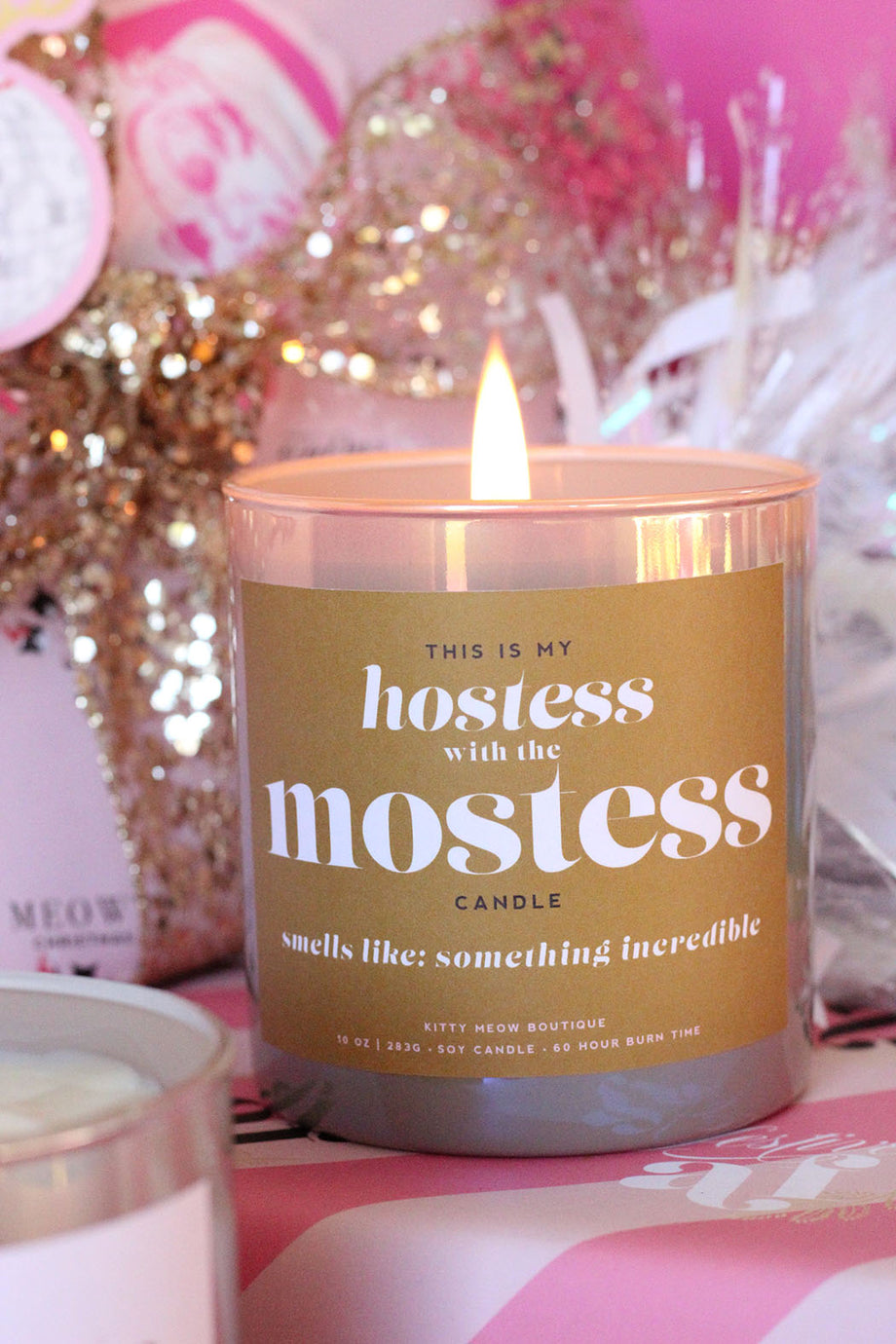 https://kittymeowboutique.com/cdn/shop/files/Kitty-Meow-Candle_Hostess-Mostess_3_460x@2x.jpg?v=1699618997